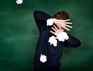 How can schools prevent and manage bullying
